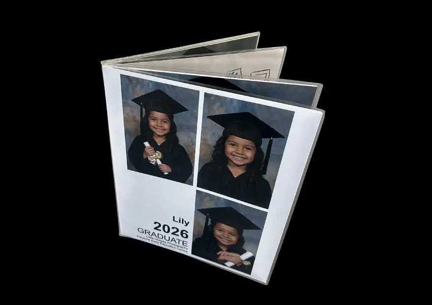 The bound Graduation Pack keepsake book standing upright, showing its personalised cover