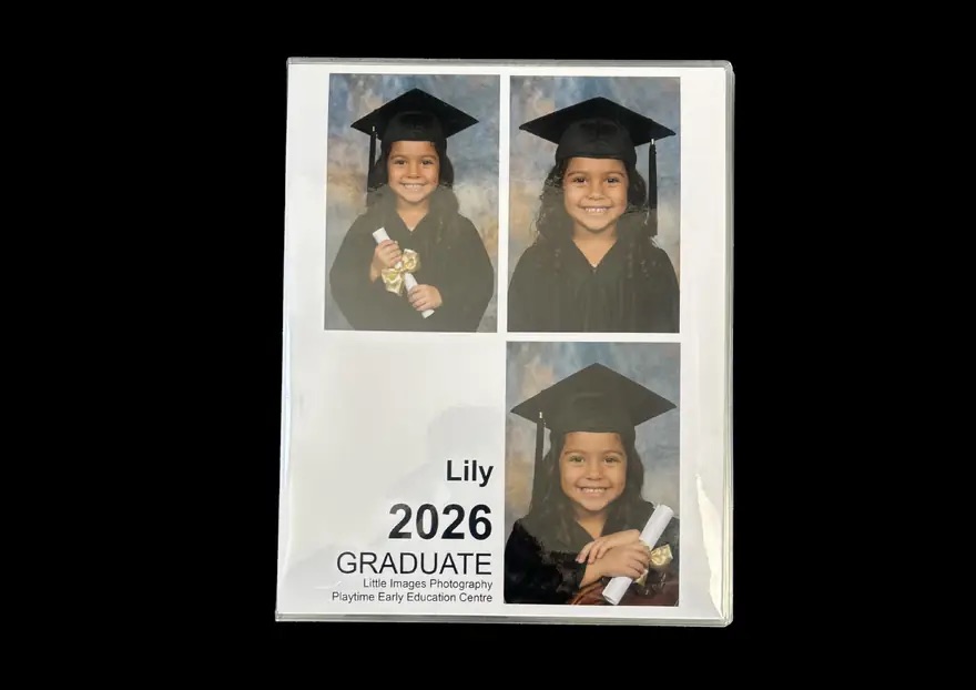 Front cover of the keepsake book, personalised with the child's portraits, name, year, and centre